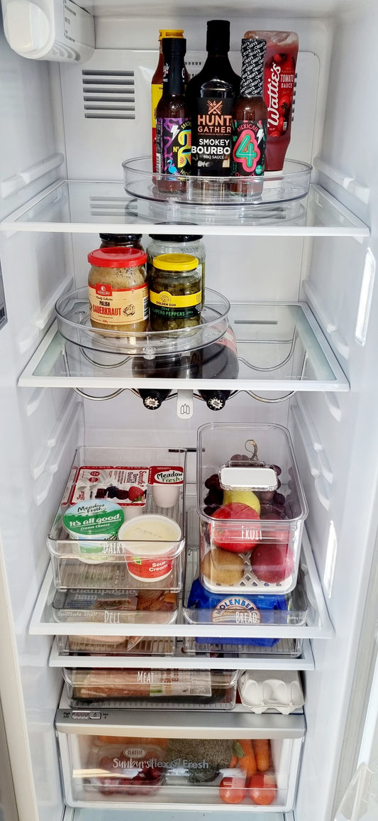 Organised fridge featuring storage containers NZ and fridge organisation solutions for tidy and efficient NZ homes.