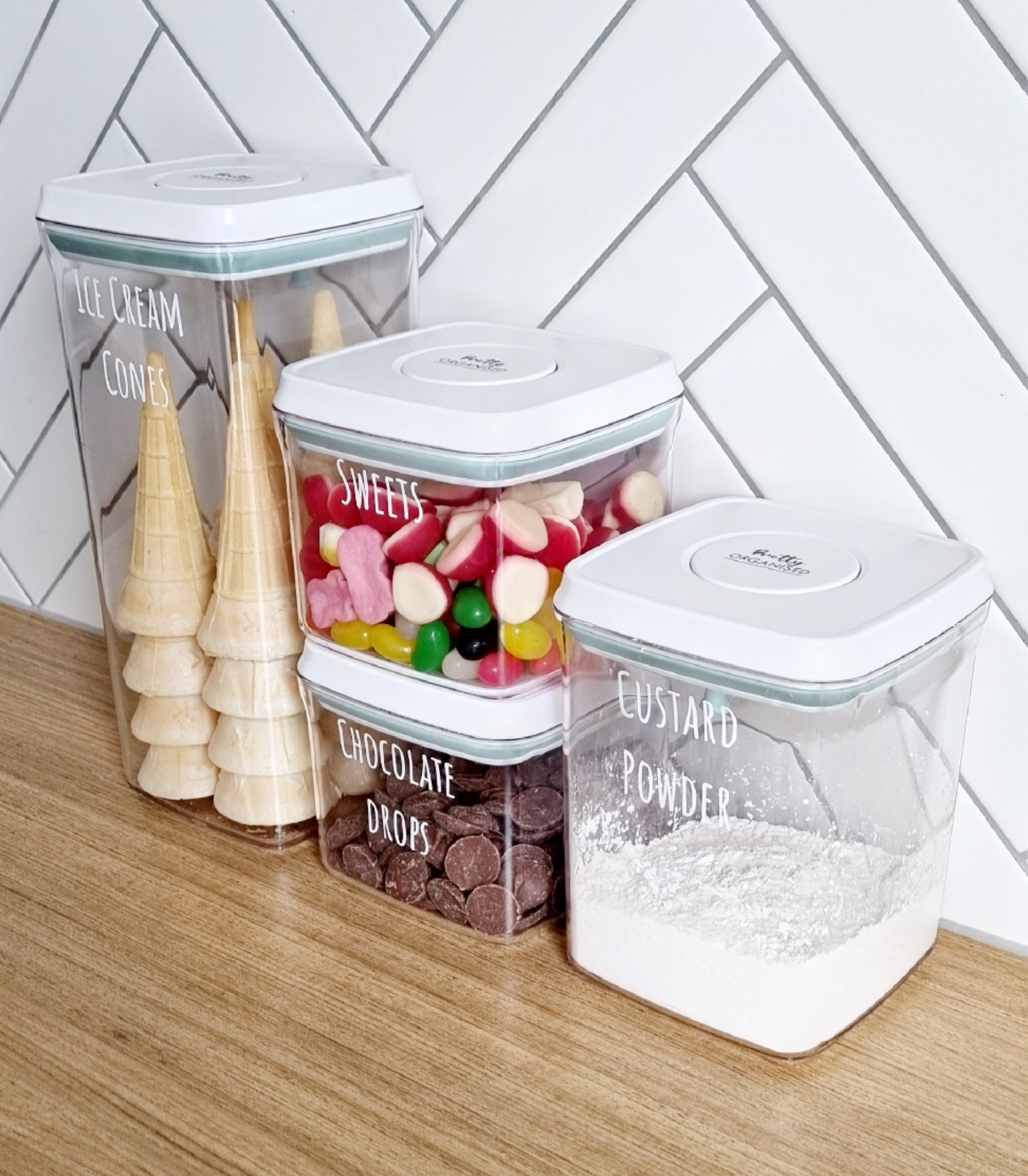 Plastic push-tight airtight containers, ideal for pantry organisation, kitchen storage, and decluttering services NZ.