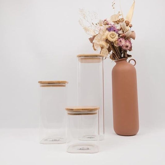 Square glass containers with bamboo lids, perfect for pantry organisation and kitchen storage in NZ.