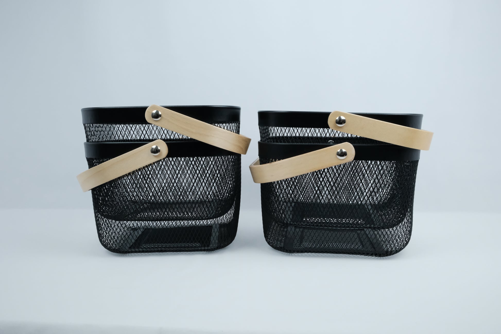 Wire baskets with bamboo handles, perfect for stylish pantry organisation and kitchen storage in NZ homes.