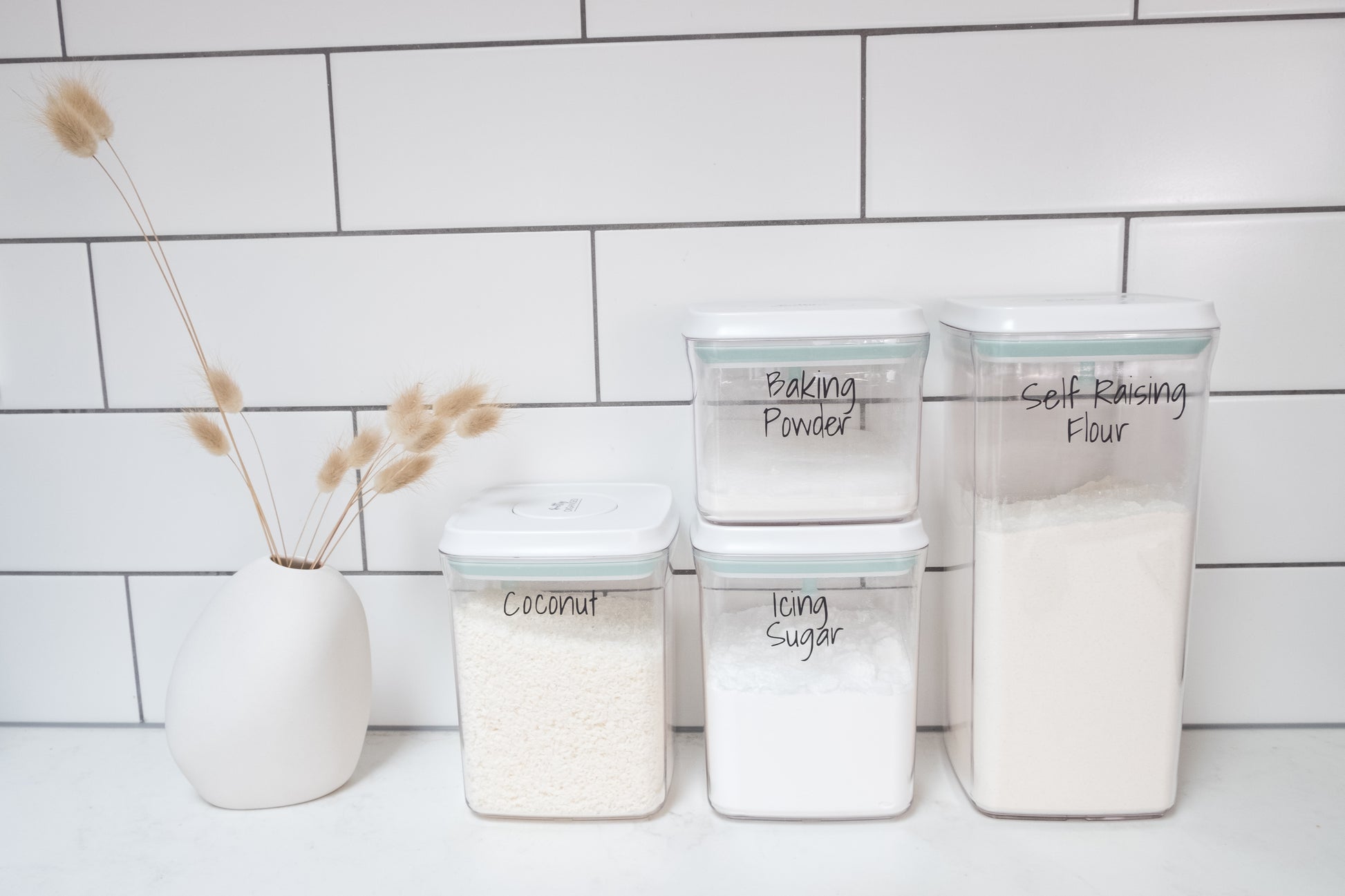 Plastic push-tight airtight containers, perfect for pantry organisation, kitchen storage, and decluttering services NZ.