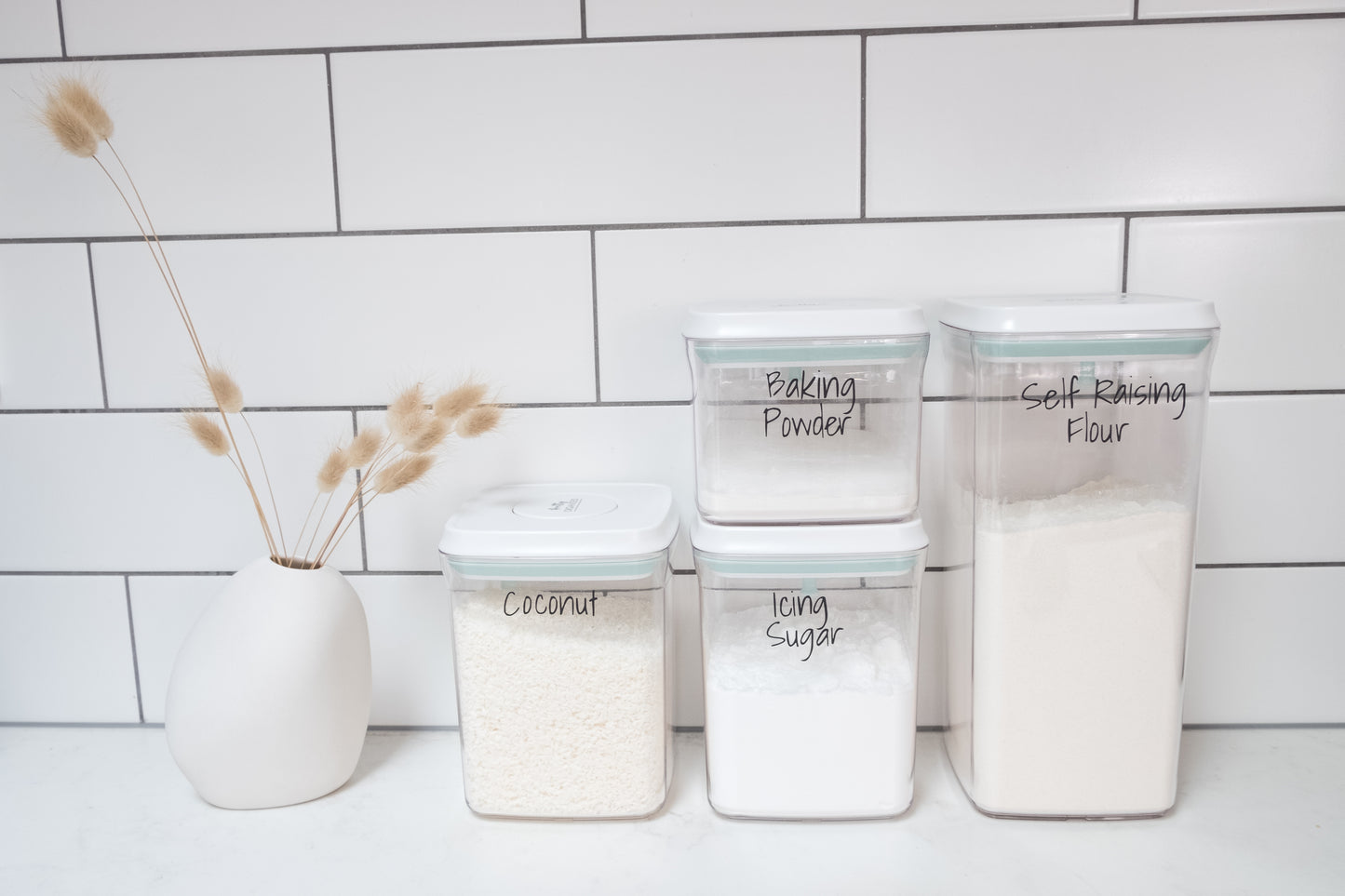 Plastic push-tight airtight containers, ideal for pantry organisation, kitchen storage, and home organisation services NZ.