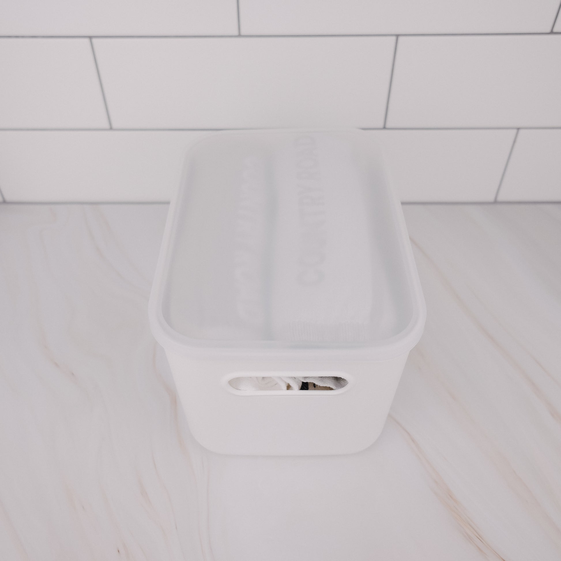 Mini Everything Tub, a clear plastic container ideal for pantry organisation, kitchen storage, and decluttering services NZ.