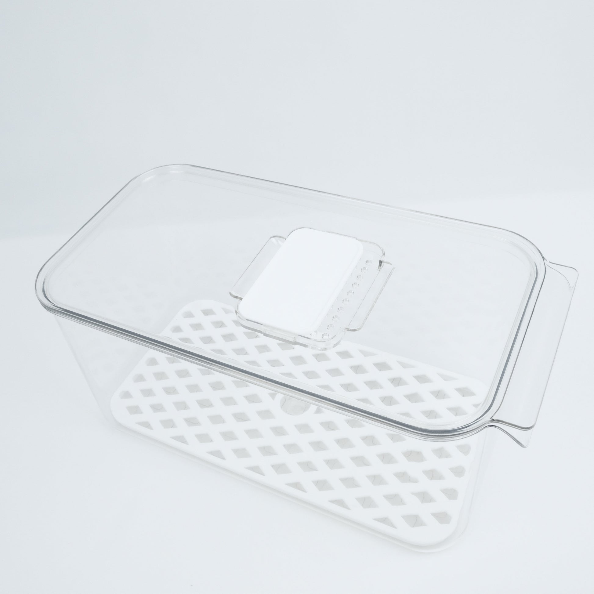 Vented fridge container keeping food fresh, ideal for fridge organisation, kitchen storage, and decluttering services NZ.