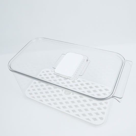 Vented fridge container keeping food fresh, ideal for fridge organisation, kitchen storage, and decluttering services NZ.