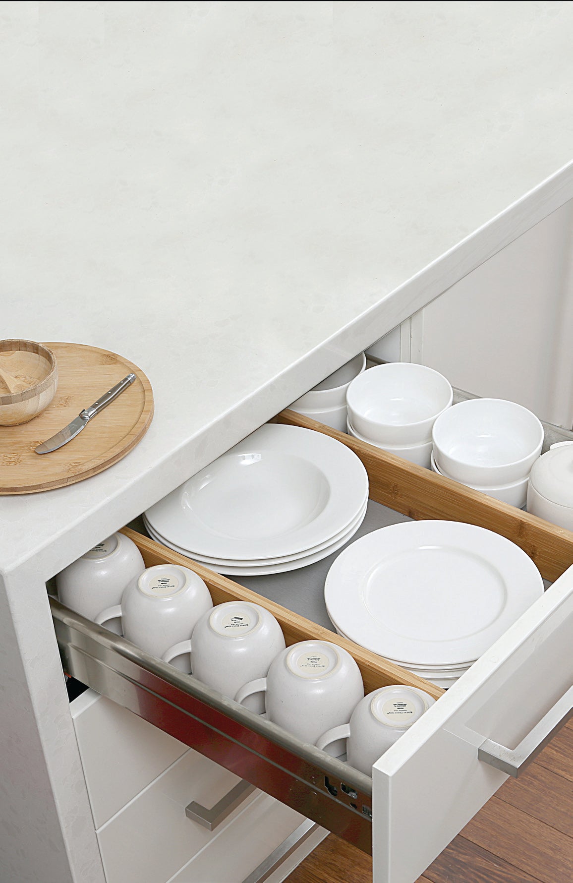 Deep bamboo drawer divider with adjustable spring mechanism, designed to organise and separate items in wide or deep drawers.