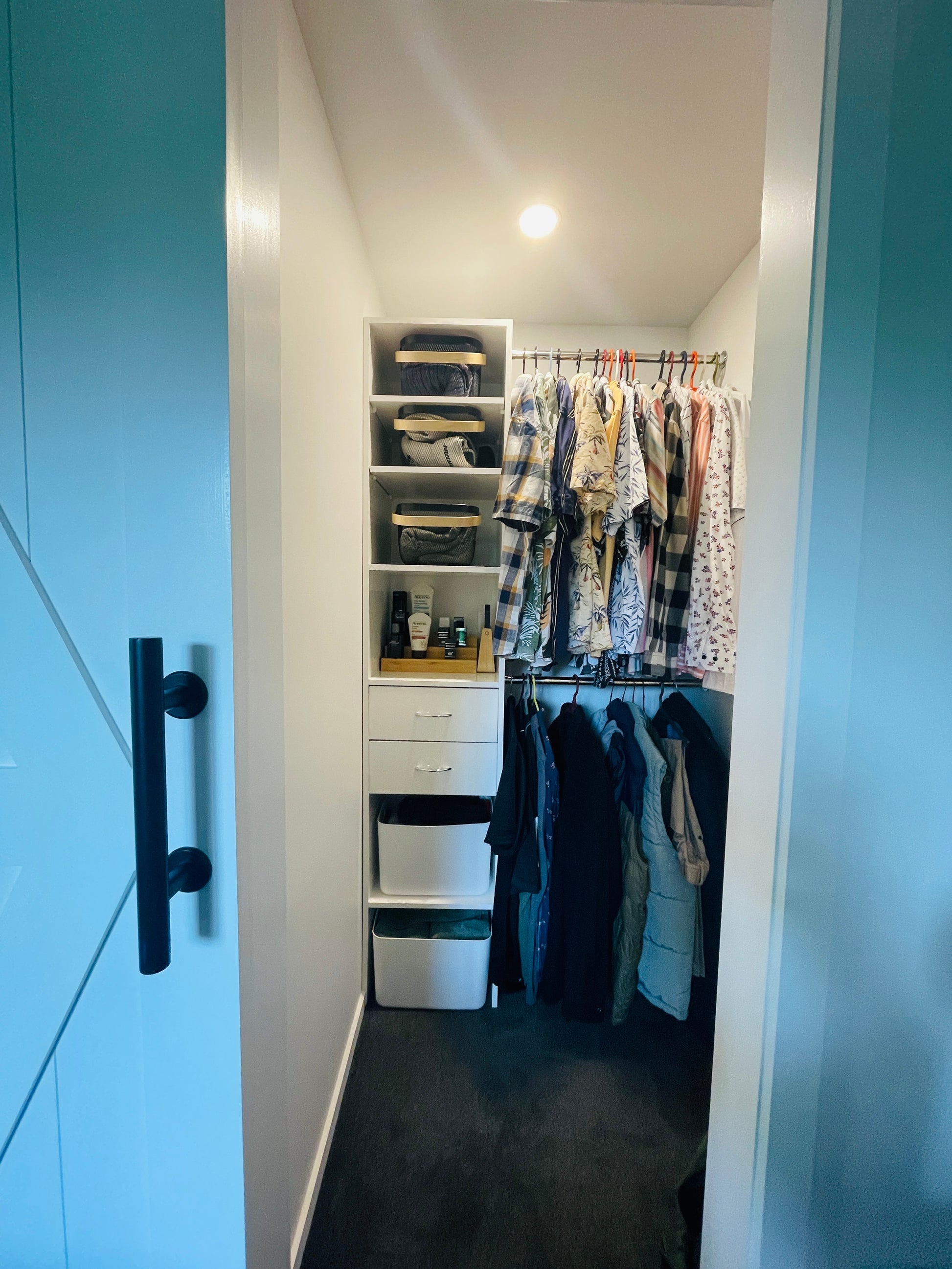 Organised wardrobe showcasing effective home organisation services and decluttering solutions for NZ homes.