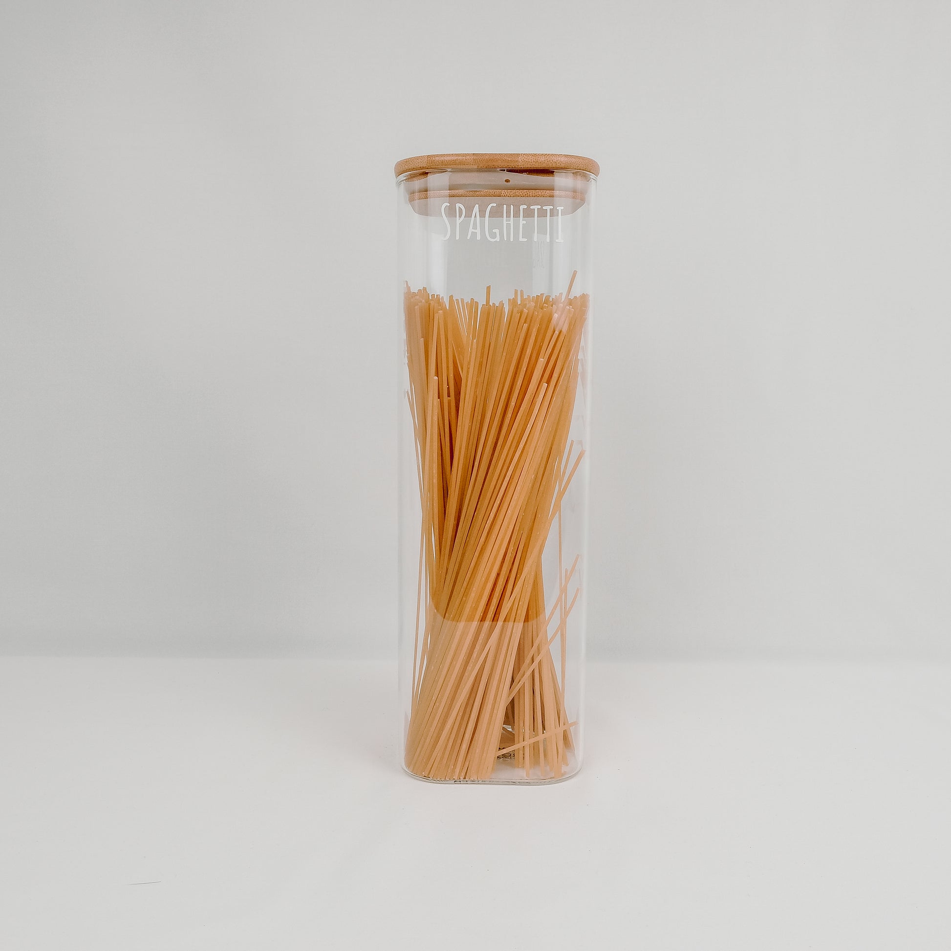 2500ml square glass container with bamboo lid, ideal for kitchen storage, pantry organisation, and decluttering services NZ.
