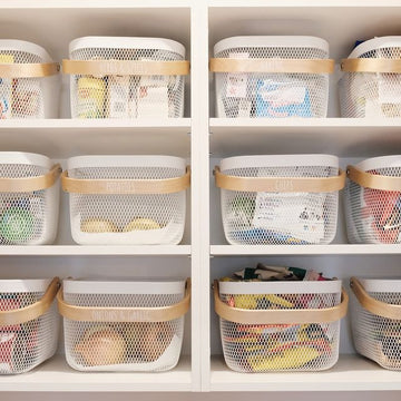 Set of wire baskets with bamboo handles, ideal for pantry organisation, kitchen storage, and decluttering services NZ.

