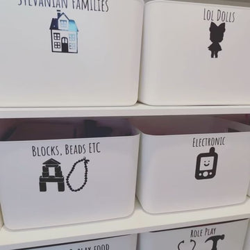 Everything tubs filled with kids’ toys, ideal for home organisation and decluttering solutions in NZ households.
