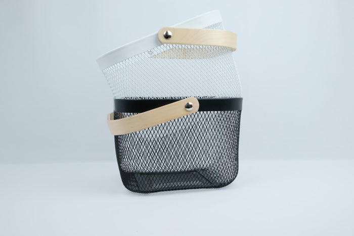 Wire basket with bamboo handle, perfect for organising kitchen storage and pantry spaces in NZ homes.

