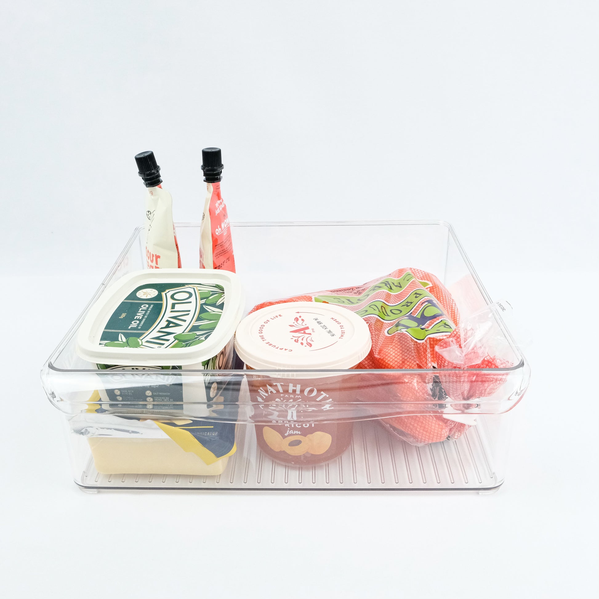 Large plastic fridge tray for fridge organisation and kitchen storage, ideal for tidy NZ home solutions.
