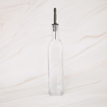 Glass oil bottle with black plastic pourer, perfect for kitchen storage and pantry organisation in NZ homes.
