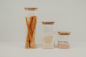 Square glass containers with bamboo lids, ideal for pantry organisation, kitchen storage containers NZ.
