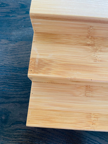 Bamboo spice rack for neat spice organisation and efficient kitchen storage in NZ homes.
