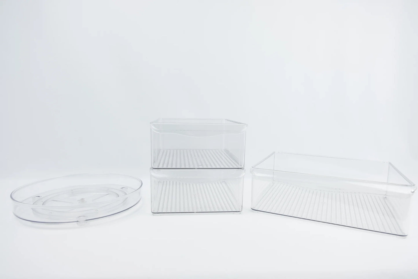 Fridge trays and turntables set for organised fridge storage, perfect for fridge organisation, kitchen storage, and decluttering services NZ.
